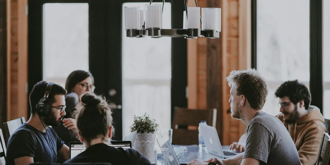 A team in discussion around a table