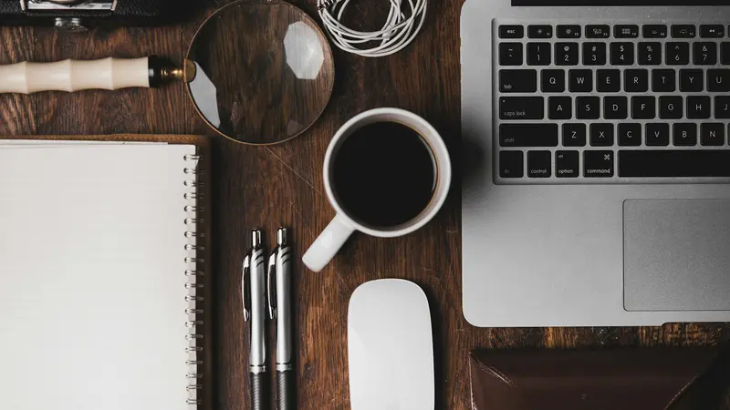 A notebook and pen on a desk